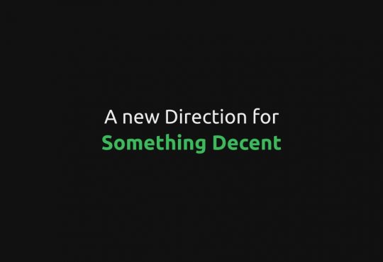 The words 'a new direction for something decent' written on a black background